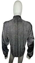 Load image into Gallery viewer, Experience the ultimate 70&#39;s vibe with this shiny sparkly Lame&#39; lurex fabric silver button party top from Judy Bond. Don&#39;t let the pictures deceive you, it&#39;s even better in person. Measured Flat Chest - 38&quot; Sleeve - 25&quot; Waist - Length - 29&quot;.
