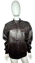 Load image into Gallery viewer, In perfect condition, this Vintage Brown Leather Members Only jacket is a rare find! The zip-up bomber jacket features a unique shoulder collar strap and has chest, sleeve, and length measurements of 40&quot;, 26&quot;, and 28&quot; when laid flat. Don&#39;t miss out on...
