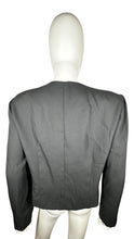 Load image into Gallery viewer, Introducing the Vintage Leslie Fay Black Crop Blazer - the perfect combination of chic and playful! This blazer features a front button closure, satin bow detail, and shoulder pads, along with measurements of 35&quot; chest, 22&quot; sleeves, and 21&quot; length when...