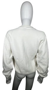 Get ready to make a statement with this cool Vintage Jerzeez See Jane Jump sweatshirt in white! The laid-back length of 24" is perfect for jumping around, and the sleeves measuring 38" will keep you feeling comfy and stylish.