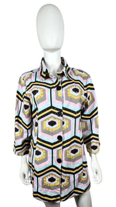 Get ready to funk it up with this groovy blazer featuring a playful mix of colors and geometric shapes. With a flat chest measurement of 41", sleeve length of 18", and overall length of 31", this blazer is as funky as it is fabulous.