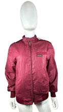 Load image into Gallery viewer, Revamp your wardrobe with the Vintage Members Only Maroon Jacket! This zip up jacket features a unique two button collar that adds a touch of sophistication and charm. Plus, its flattering measurements of 41&quot; flat chest, 24&quot; sleeves, and 25&quot; length wil...