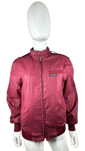 Revamp your wardrobe with the Vintage Members Only Maroon Jacket! This zip up jacket features a unique two button collar that adds a touch of sophistication and charm. Plus, its flattering measurements of 41" flat chest, 24" sleeves, and 25" length wil...