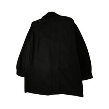 Load image into Gallery viewer, This pristine vintage Donny Brook peacoat is made of rare heavy black wool, featuring magnificent lion head bronze buttons. Measuring at 46 inches across the chest, with 25-inch sleeves and a length of 40 inches, it is a true gem.
