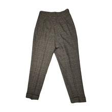 Load image into Gallery viewer, A unique throwback Liz Claiborne collection featuring a luxurious wool tweed suit adorned with houndstooth pattern. This suit comes with a blazer and pants set, with measurements of blazer chest at 30 inches, sleeve at 23 inches, and length at 29.5 inc...