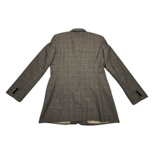 Load image into Gallery viewer, A unique throwback Liz Claiborne collection featuring a luxurious wool tweed suit adorned with houndstooth pattern. This suit comes with a blazer and pants set, with measurements of blazer chest at 30 inches, sleeve at 23 inches, and length at 29.5 inc...