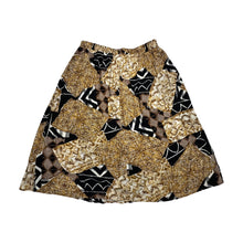 Load image into Gallery viewer, A vintage Norton McNaughton Petites 2-Piece Set with a abstract safari inspired button up short sleeve and skirt. Measured Flat TopChest - 40&quot;Sleeve - 10&quot;Length - 27&quot; Bottom Waist - 30&quot;Hips - 60&quot; Length - 30&quot;