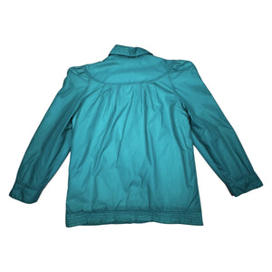 This vintage windbreaker jacket in medium size features a striking teal color and exaggerated shoulders, reminiscent of the bold styles from the 80's and 90's. The measurement details are as follows: chest - 41 inches, sleeve - 24 inches, and length -...