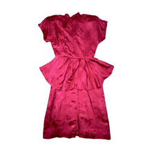 Load image into Gallery viewer, An 80’s vintage bright pink peplum dress with floral print on the silk. Measured Flat Chest- 32” Waist- 26” Hips- 36” Length- 41”