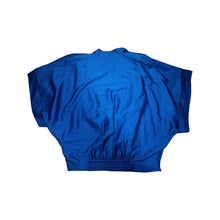 Load image into Gallery viewer, Experience luxury in this excellent condition blue silk blouse from Designer Diane Von Furstenberg. With its kimono-style drape and waist elastic stretch band, it&#39;s perfect for sizes small-medium.