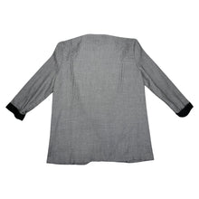 Load image into Gallery viewer, Experience the timeless style and sophistication of the Vintage Marnie Houndstooth 80s Blazer. This stunning black and white blazer features two front pockets, a single front button, and stylish black cuffs on the sleeves. With a measured flat chest of...