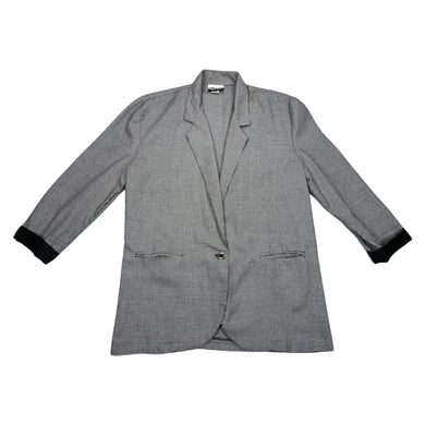This is a Houndstooth Vintage 80s Marnie black and white blazer with two front pockets one front button and black cuffs on the sleeve.      Measured Flat    Chest - 36