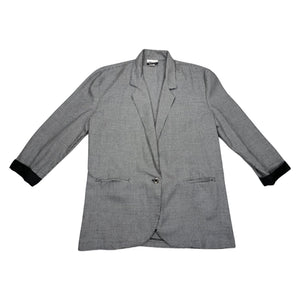 This is a Houndstooth Vintage 80s Marnie black and white blazer with two front pockets one front button and black cuffs on the sleeve.      Measured Flat    Chest - 36"  Sleeve - 21"  Length - 31"