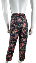Load image into Gallery viewer, Get ready to bloom in the SugarLips Floral Print Pant! With a boot cut design and side zipper, these black pants feature an all over floral print that adds a touch of playful femininity to your outfit. Measured Flat Waist - 30&quot; Hips - 41&quot; Inseam - 25 1...