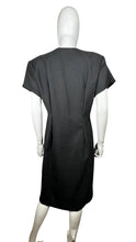 Load image into Gallery viewer, The Vintage 80&#39;s Rare Find David Mitchell Dress boasts a black hue and bold, vibrant oversized buttons. With measurements of Chest - 35&quot;, Hips - 34&quot;, and Length - 43&quot;, this dress offers a fun and unique twist to the classic little black dress.