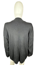 Load image into Gallery viewer, Experience the ultimate blend of style and comfort with our Vintage AfterShock Sweatshirt. This black long sleeve has been beautifully crafted with gold embellishment, embroidered tassels, and shoulder pads. Measured at 46&quot; for the chest, 25&quot; for the s...