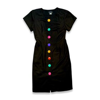 The Vintage 80's Rare Find David Mitchell Dress boasts a black hue and bold, vibrant oversized buttons. With measurements of Chest - 35