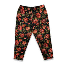 Load image into Gallery viewer, The vintage high waisted Léger Floral Pant is a %100 Rayon cigarette style pant with an all over floral print.  Measured Flat   Waist - 26&quot;  Hips - 45&quot;  Inseam - 28&quot;  Length - 41&quot;   