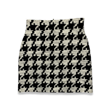 The Houndstooth Skirt is a black and white skirt with zipper and houndstooth all over print.  Measured Flat  Waist - 28