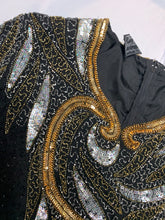 Load image into Gallery viewer, Get ready to shine with this Vintage Jennifer Joseph Lebon top that doubles as an oversized dress! The sequins and beads add a touch of glam, and it measures at a comfortable chest size of 46 inches with 11 1/2 inch sleeves and a 29 inch length.