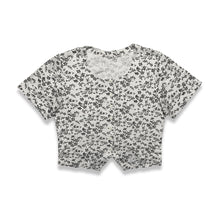 Load image into Gallery viewer, Experience a touch of nostalgia with our Vintage Black and White Floral Crop Top - the perfect blend of old and new. This short sleeve button-up piece features a chest measurement of 34&quot; and a length of 19&quot;, giving you a flattering fit.